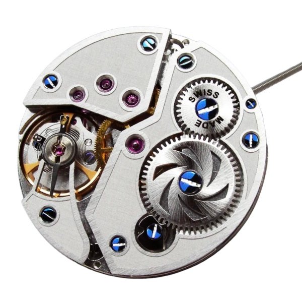 Tourby manual-wind watch movement close-up with blued screws, ruby jewels, and visible balance wheel