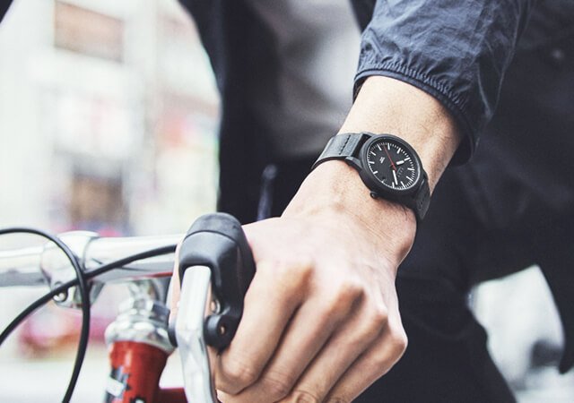 Knot TS1-36 titanium solar watch lifestyle photo (official image)